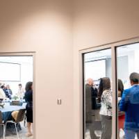 Photo from outside room of events guest inside